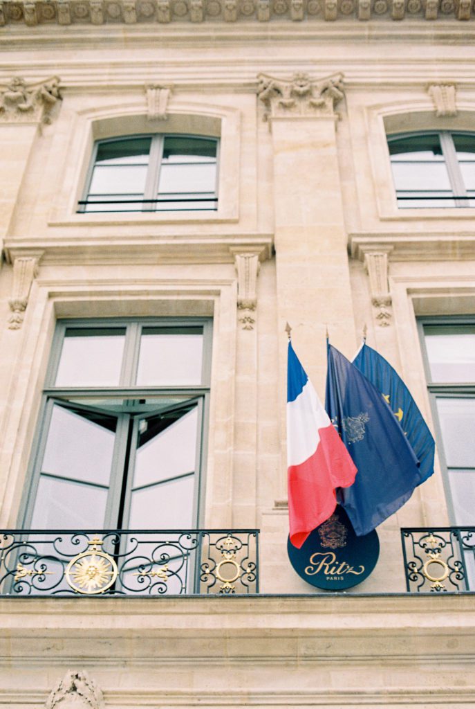 Front of Ritz Paris with flag and open window