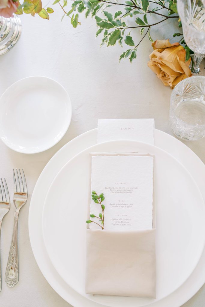 Wedding reception place setting and custom menu card for luxury wedding at Villa Sola Cabiati on Lake Como, Italy. Photographed by Italy wedding photographer, Amy Mulder Photography.