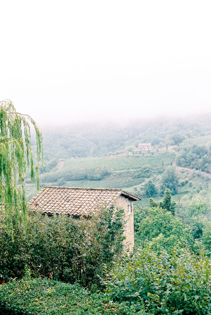 View over Tuscany hillside with fog coming in