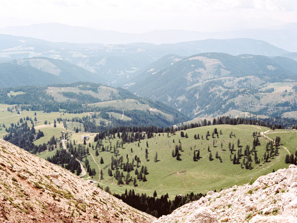 Dolomite region in Italy as viewed from the top of a mountain range.