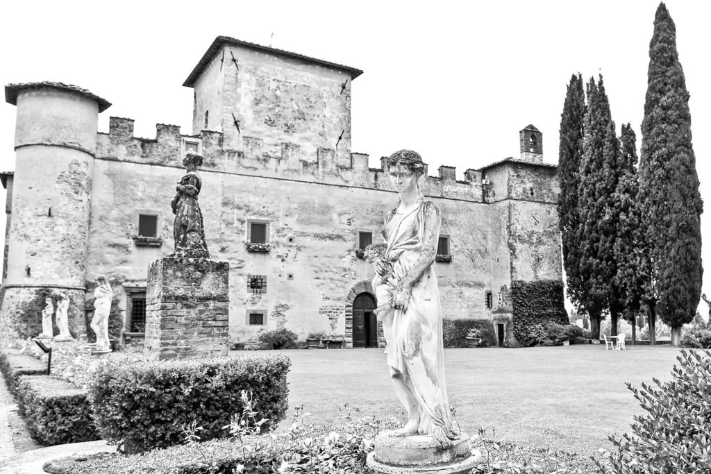 Statue outside of vineyard and winery from the 1400s in Tuscany Italy.