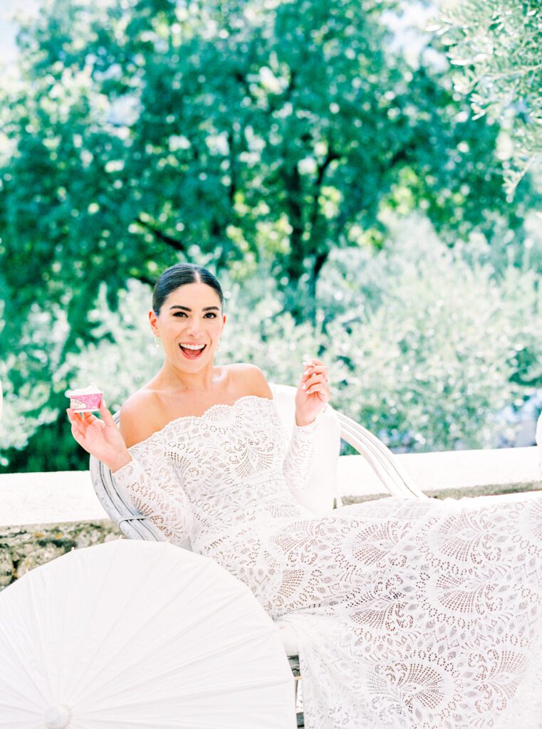 Bride with gelato at her Tuscany Wedding at Villa Montanare near Cortona, Italy photographed by Italy wedding photographer 