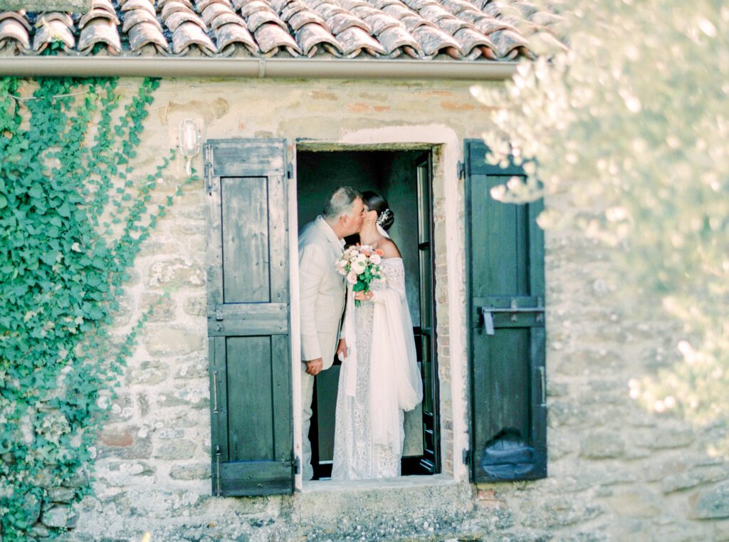 Father daughter moment right before wedding ceremony at Tuscany Wedding in the olive grove at Villa Montanare near Cortona, Italy photographed by Italy wedding photographer 