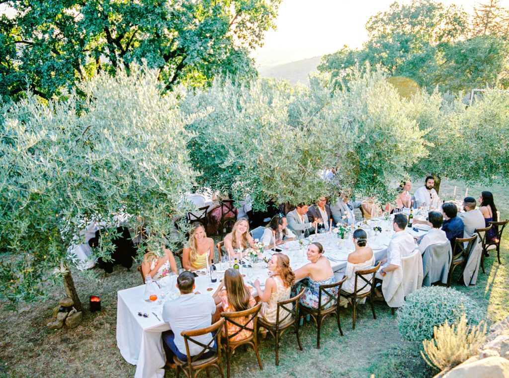 Tuscany Wedding reception in the olive grove at Villa Montanare near Cortona, Italy photographed by Italy wedding photographer 