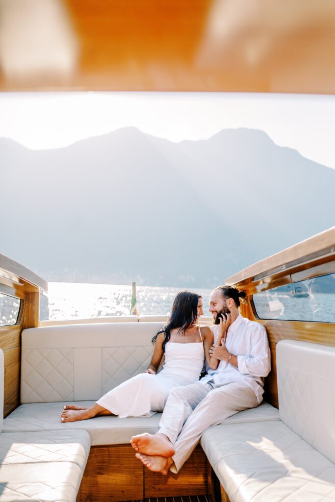 Film photograph of Lake Como engagement session a wooden boat photographed by Lake Como photographer