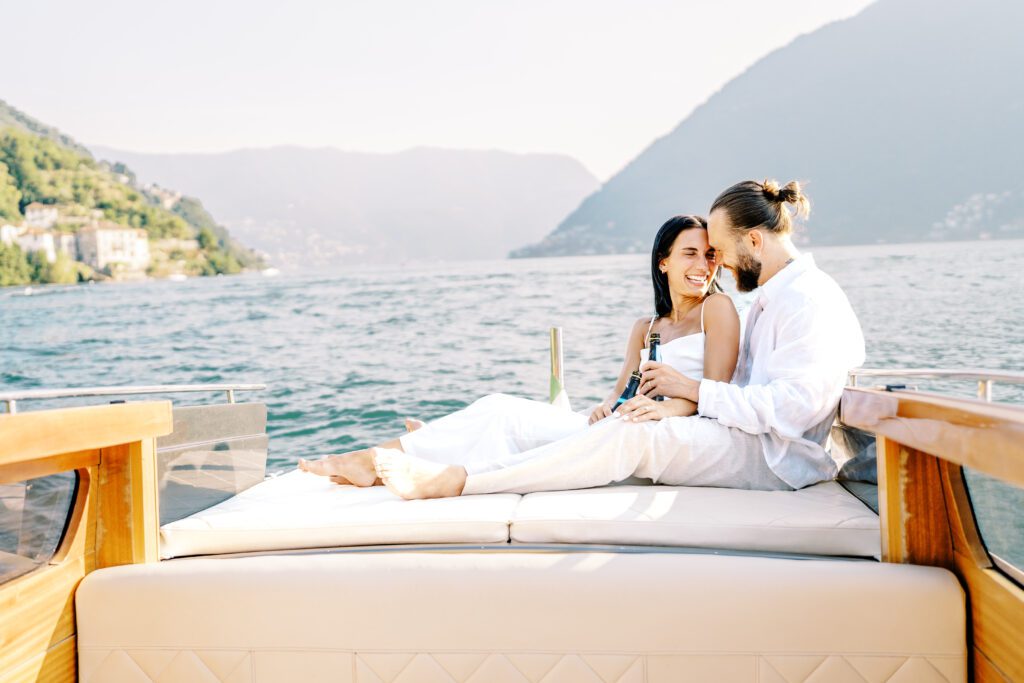 Film photograph of Lake Como engagement session a wooden boat photographed by Lake Como photographer