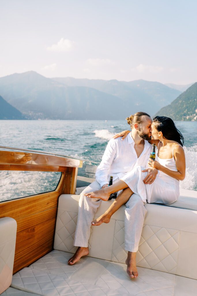 Film photograph of Lake Como engagement session a wooden boat photographed by Lake Como photographer