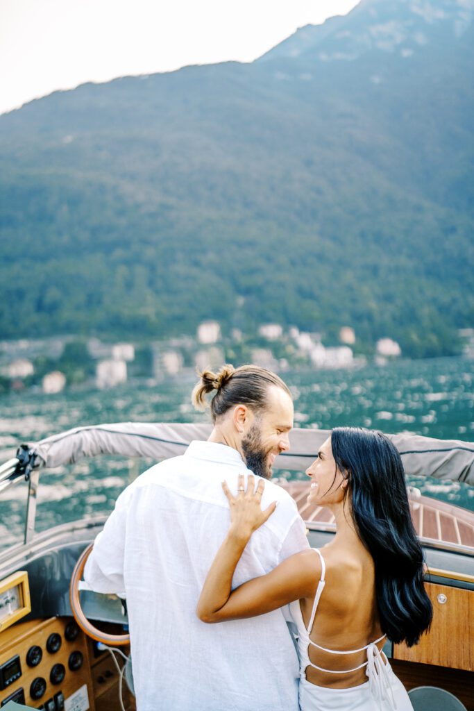 Lake Como engagement session a wooden boat photographed by Lake Como photographer