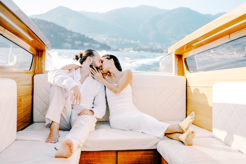 Film photograph of Lake Como engagement session a wooden boat photographed by Lake Como photographer