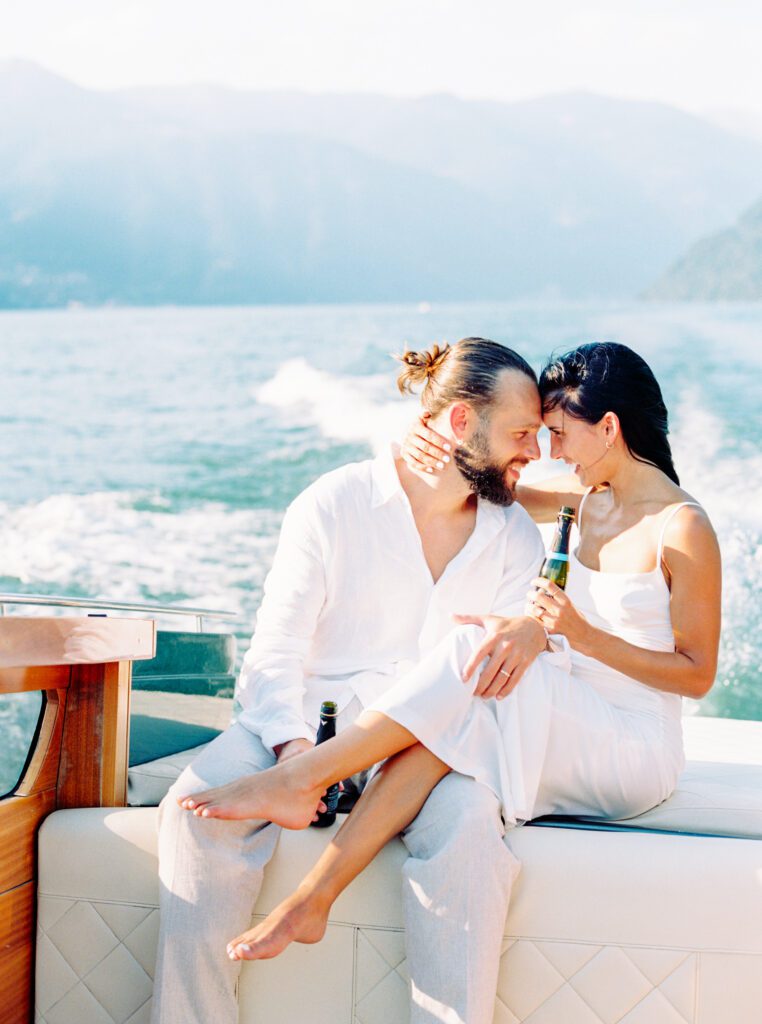 Film photograph of Lake Como engagement session a wooden boat photographed by Lake Como photographer