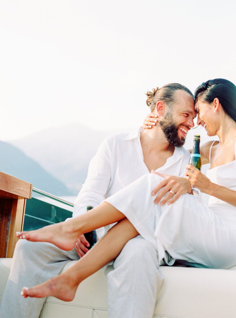 Film photograph of Lake Como engagement session a wooden boat photographed by Lake Como photographer