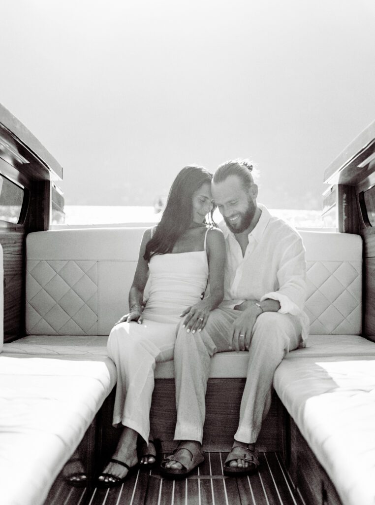 Film photograph of Lake Como engagement session a wooden boat photographed by Lake Como photographer