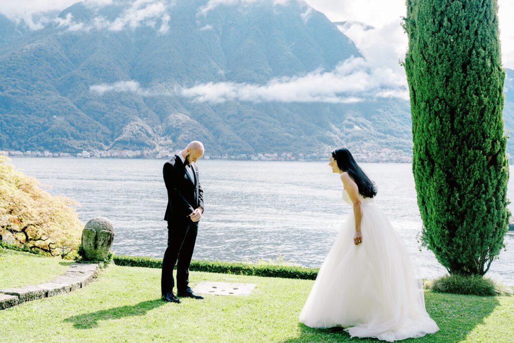 film photograph of bride and groom's first look at Lake Como elopement in Italy at Villa la Cassianella photographed by Lake Como photographer