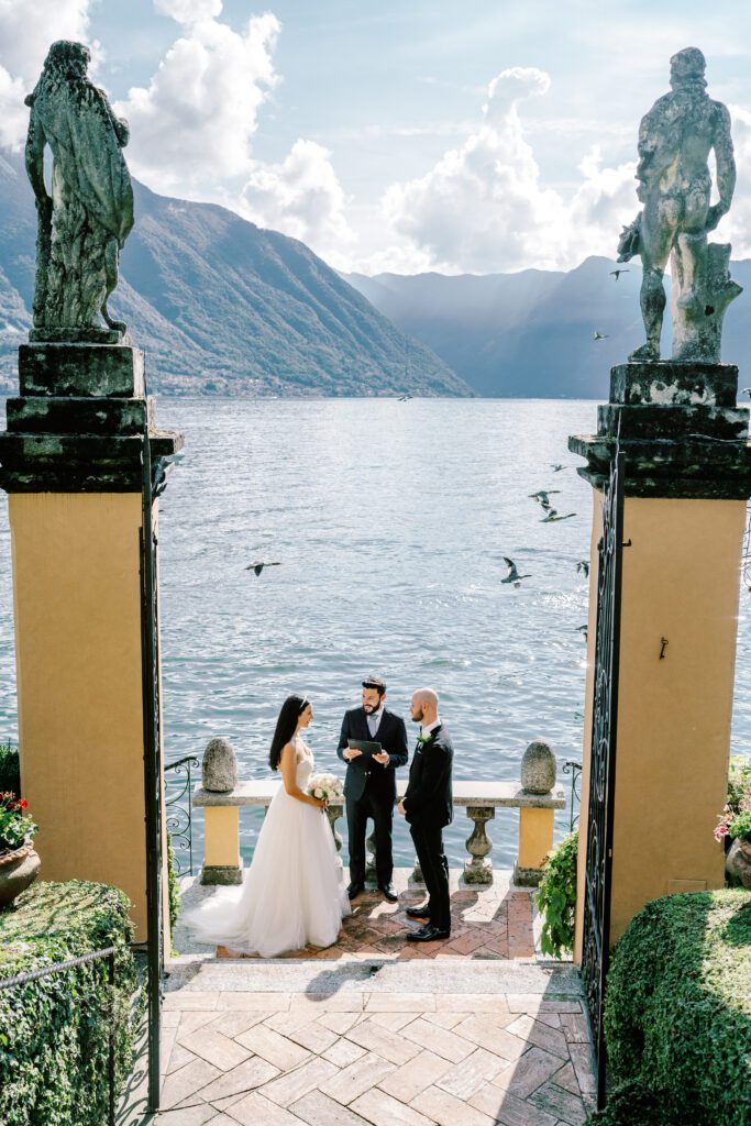 film photograph of bride and groom during their ceremony at Lake Como elopement in Italy at Villa la Cassianella photographed by Lake Como photographer