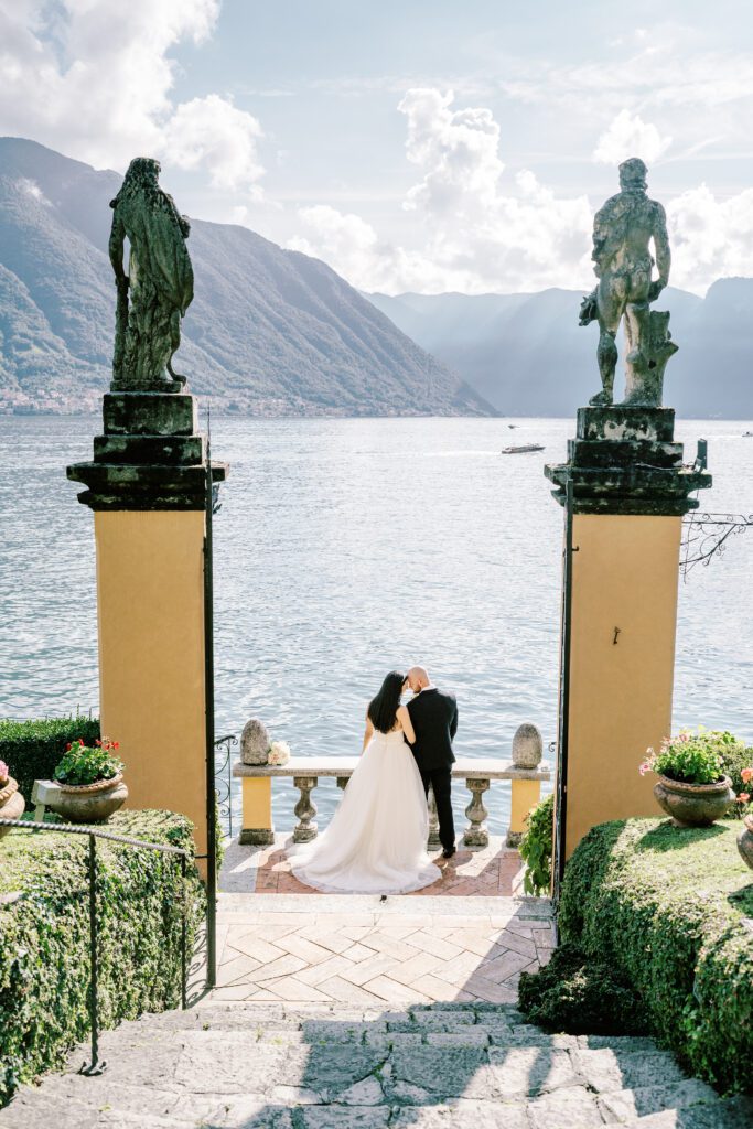 film photograph of bride and groom during their ceremony at Lake Como elopement in Italy at Villa la Cassianella photographed by Lake Como photographer