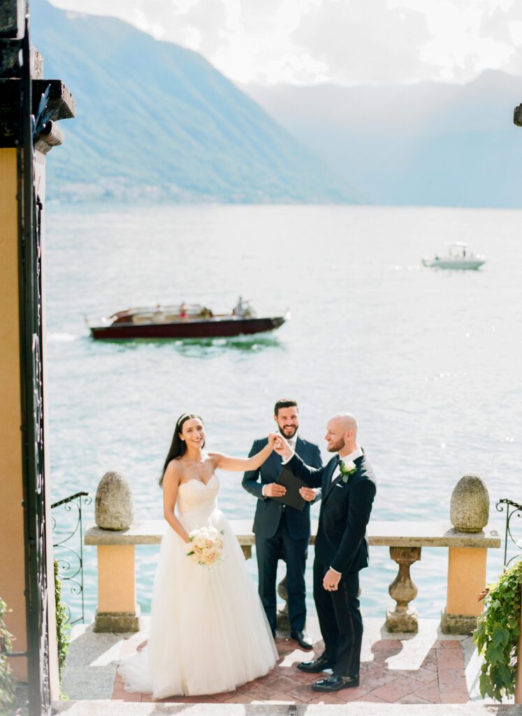 film photograph of bride and groom during their ceremony at Lake Como elopement in Italy at Villa la Cassianella photographed by Lake Como photographer