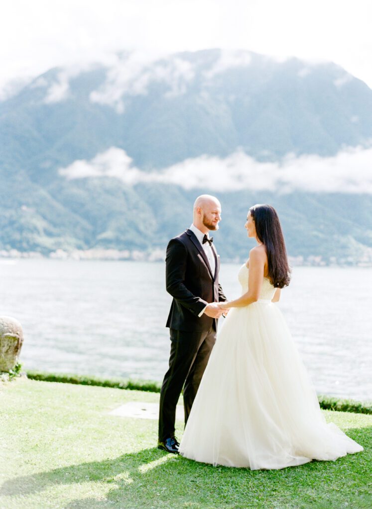 film photograph of bride and groom's first look at Lake Como elopement in Italy at Villa la Cassianella photographed by Lake Como photographer