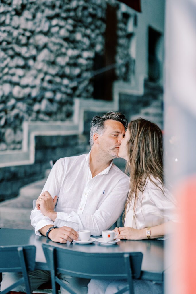 Lake Como vacation session in Argegno at cafe enjoying espresso, photographed by Lake Como photographer