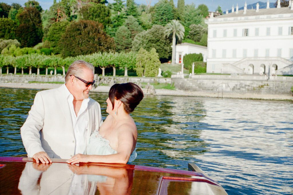 Lake Como Anniversary session on wooden boat photographed by Lake Como photographer