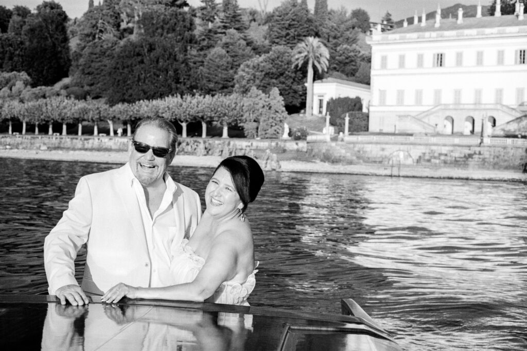 Lake Como Anniversary session on wooden boat photographed by Lake Como photographer