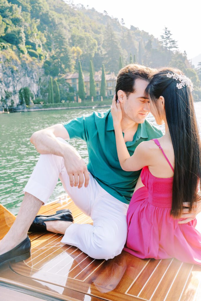Barbie fashion inspired Lake Como engagement session at Grand Hotel Tremezzo wooden boat photographed by Lake Como photographer