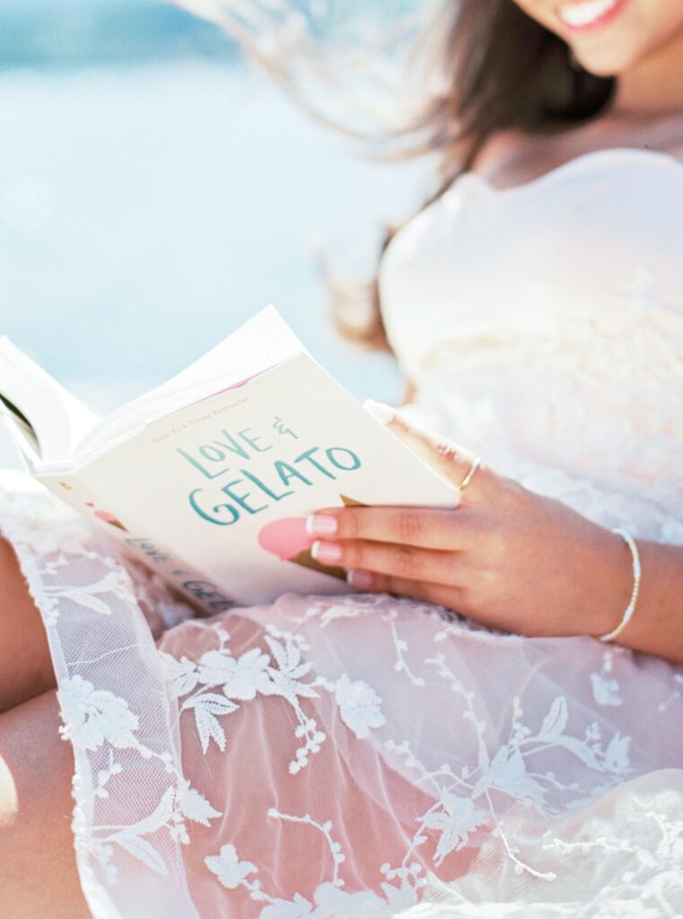 Quinceañera on wooden boat on Lake Como in Italy photographed by Lake Como photographer